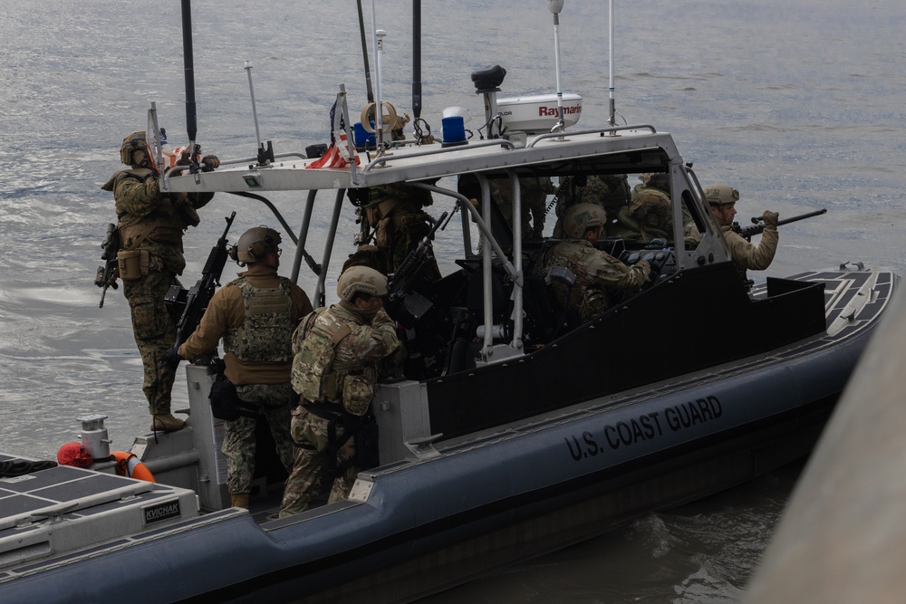 U.S. Marines with 3rd Bn., 4th Marines, U.S. Coast Guardsmen with PSU 113 conduct amphibious raid during ARCTIC EDGE 2025