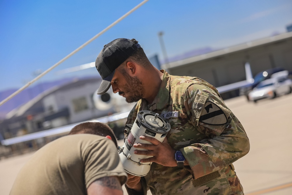 1st Air Cavalry Brigade Soldiers maintain Blackhawks to support DoD Mission