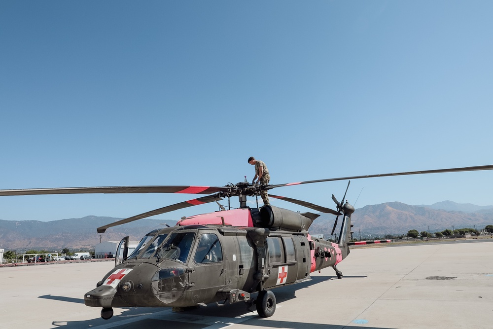 1st Air Cavalry Brigade Soldiers maintain Blackhawks to support DoD Mission