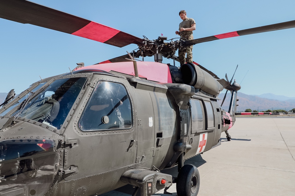 1st Air Cavalry Brigade Soldiers maintain Blackhawks to support DoD Mission