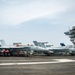 Nimitz Sailors Load Ordnance