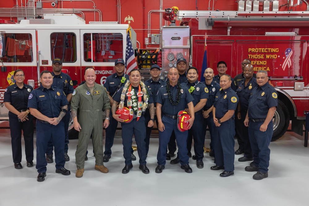 Camp Blaz Firefighters participate in a promotion ceremony