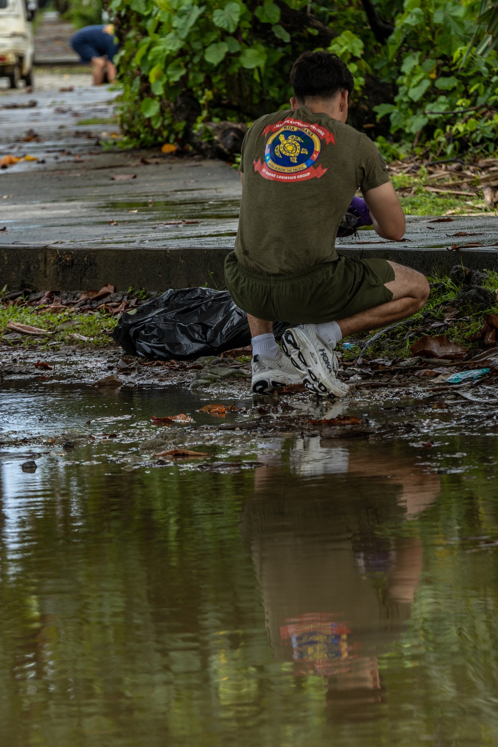 Semper Fi &amp; Sanitize: Koa Moana Marines and Sailors Clean Dekehtik Causeway With Naval Mobile Construction Battalion 4