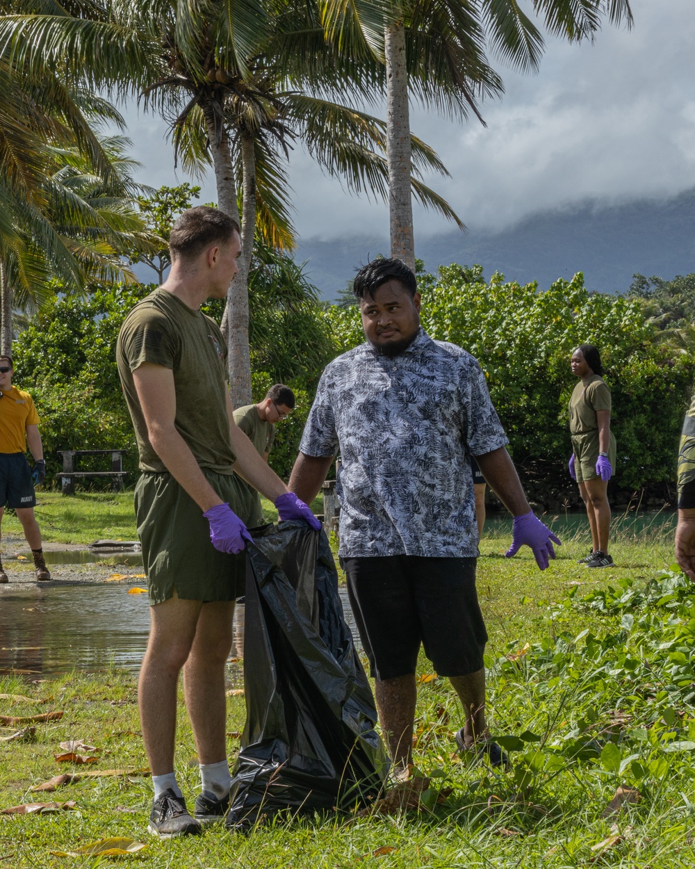Semper Fi &amp; Sanitize: Koa Moana Marines and Sailors Clean Dekehtik Causeway With Naval Mobile Construction Battalion 4