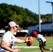 Burkham conducting drill with players at practice