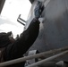 VFA-213 Sailor Conducts Maintenance