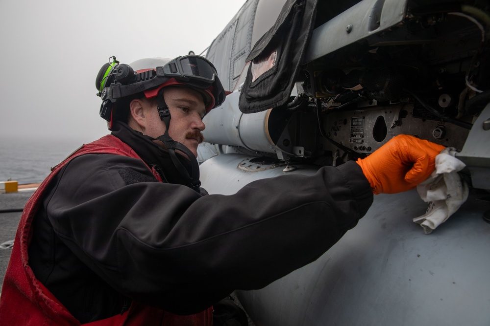 HSM-70 Sailor Conducts Maintenance
