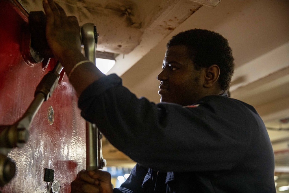 USS Gerald R. Ford (CVN 78) Sailor Conducts Maintenance