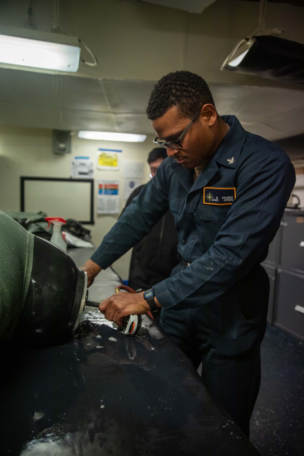 USS Gerald R. Ford (CVN 78) Sailor Conducts Quality Check