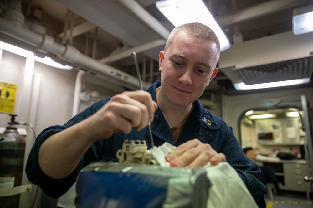 USS Gerald R. Ford (CVN 78) Sailor Conducts Maintenance