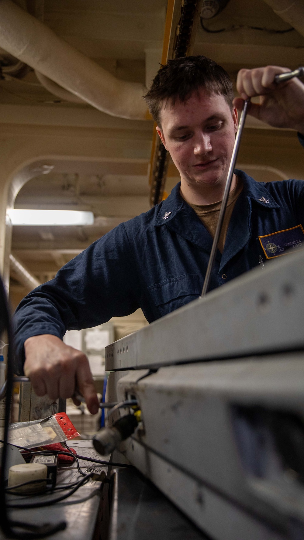 USS Gerald R. Ford (CVN 78) Sailor Conducts Maintenance