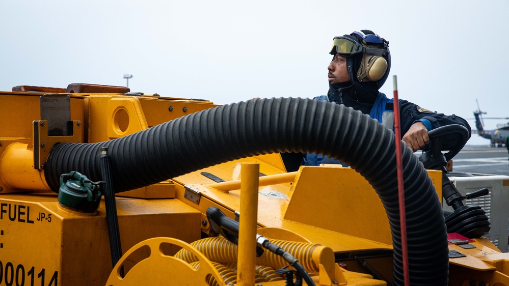USS Gerald R. Ford (CVN 78) Sailor Operates Flight Deck Equipment