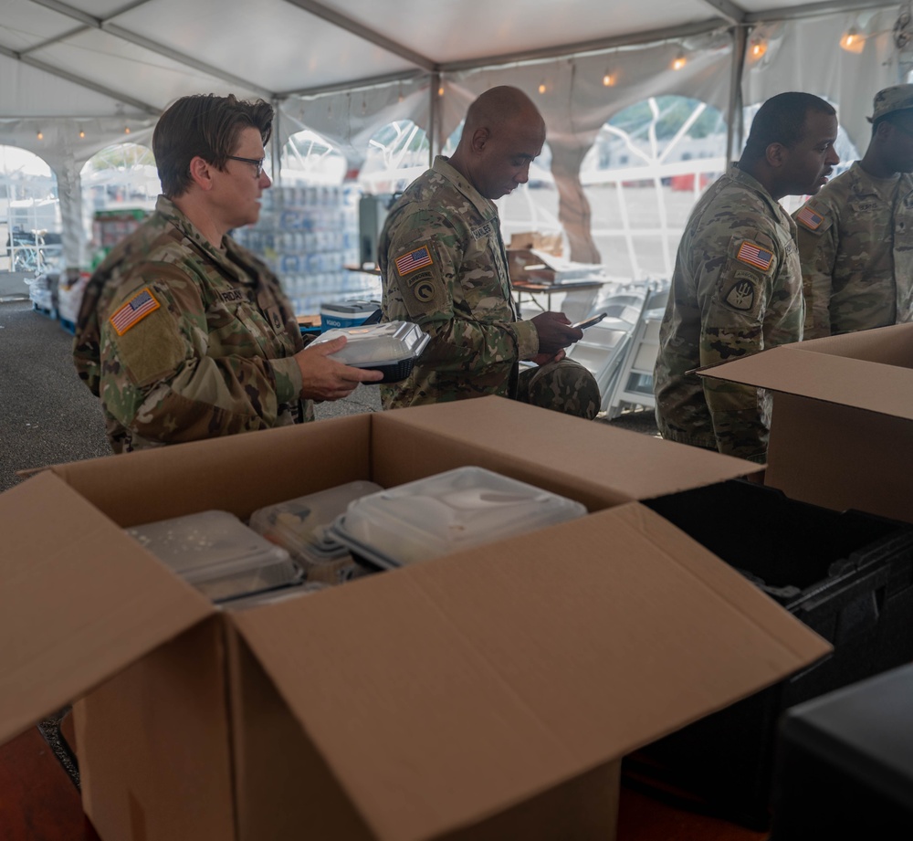 US Army Soldiers receive meals