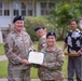 402nd AFSB commander Col. Courtney Sugai relinquishes command to Col. Matthew Amsdell in change of command ceremony