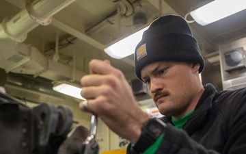 USS Gerald R. Ford (CVN 78) Sailor Conducts Maintenance