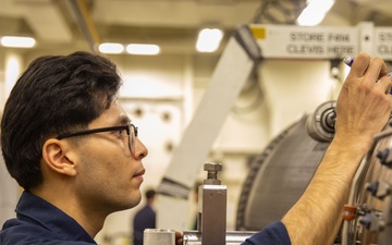 USS Gerald R. Ford (CVN 78) Sailor Conducts Maintenance
