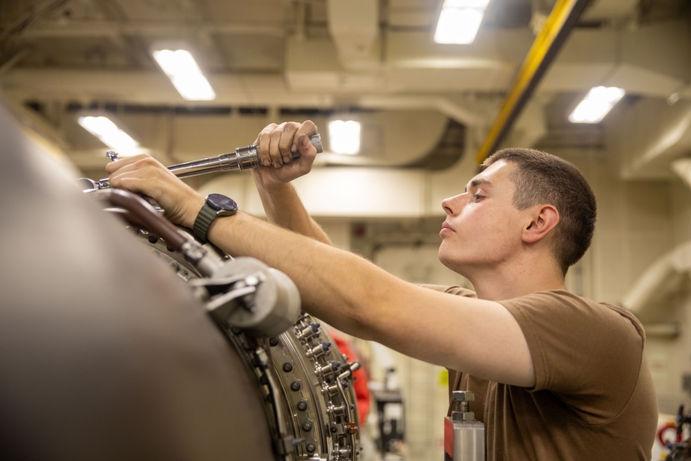 USS Gerald R. Ford (CVN 78) Sailor Conducts Maintenance