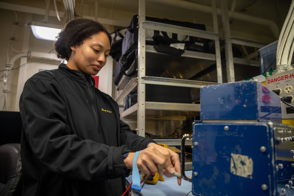 USS Gerald R. Ford (CVN 78) Sailor Tests Equipment