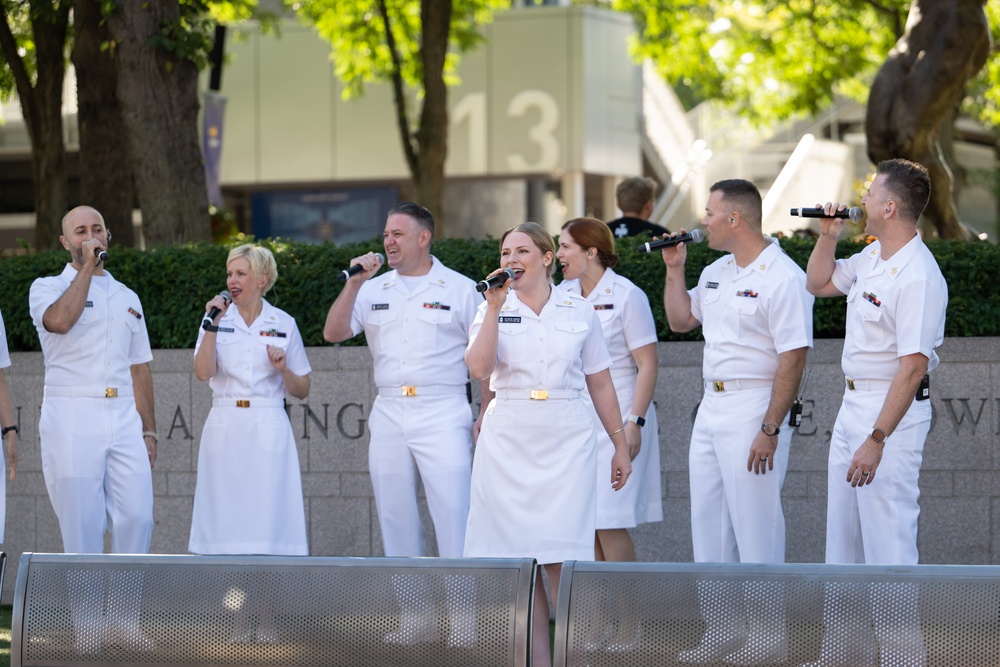 The Navy Band Sea Chanters perform at the U.S. Open Tennis Championships