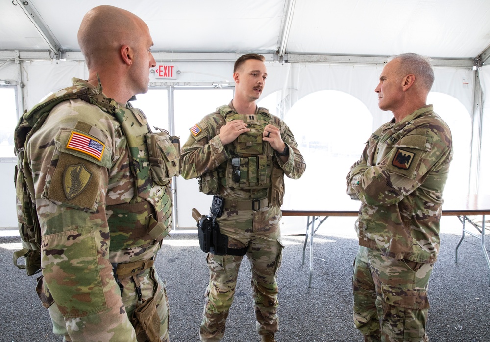 U.S. Army Maj. Gen. Ronald Burkett II, National Guard Bureau, speaks with MS Guard Soldiers