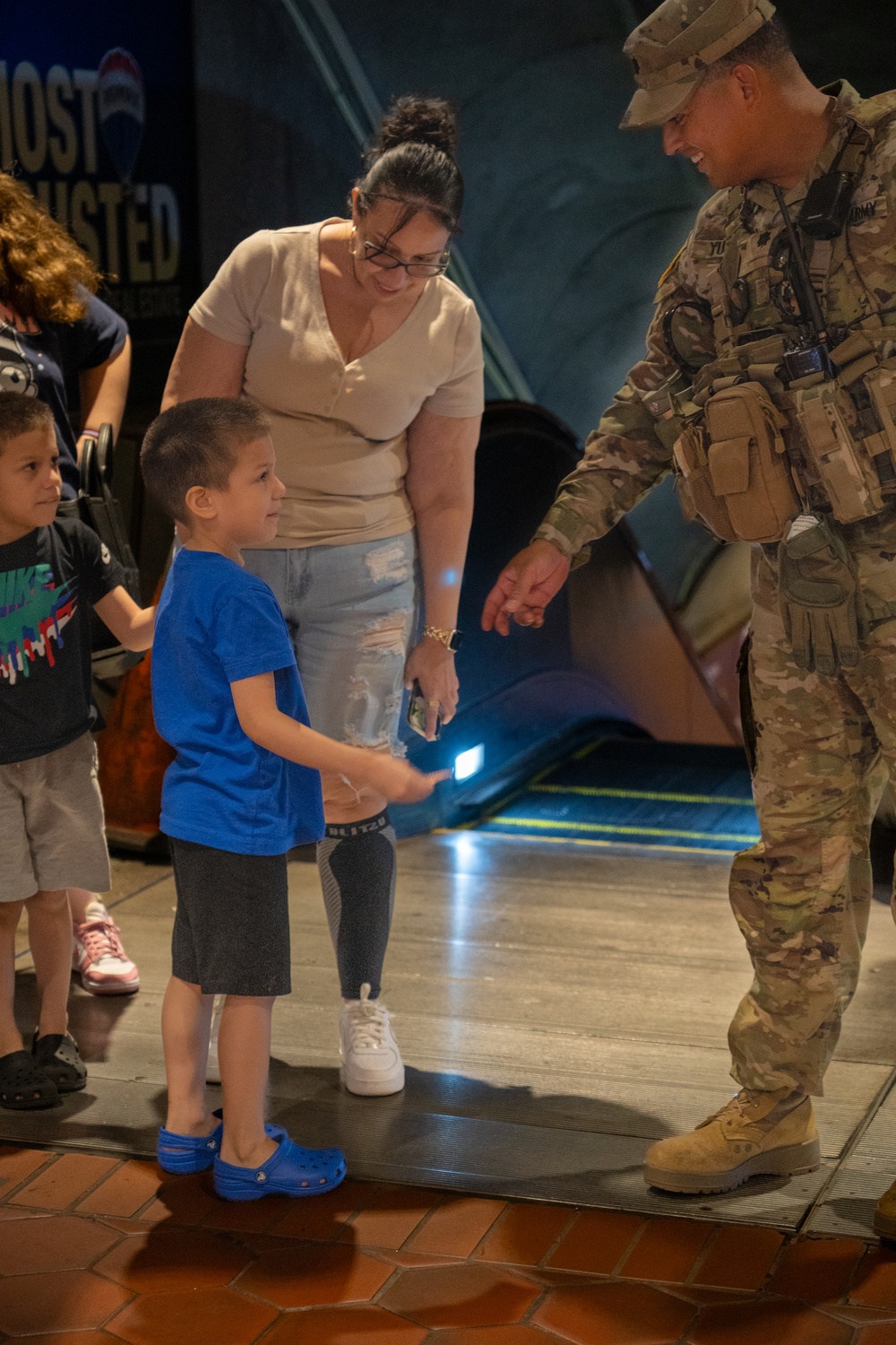 US Army Soldier Hands Child US Flag Patch in Washington, D.C.