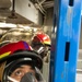 USS Mitscher (DDG 57) Sailor installs shoring during GQ