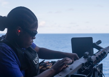 Sailors conduct a crew-served weapons live-fire exercise on the USS America (LHA 6)