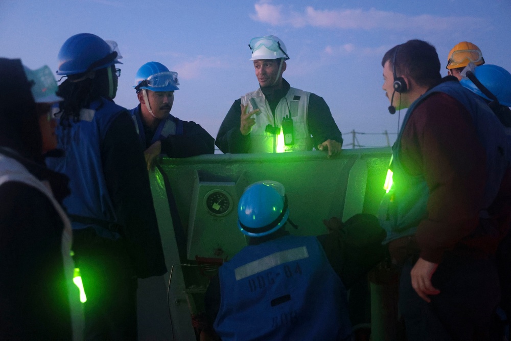 USS Bulkeley Sailors conduct a safety brief on the foc’sle