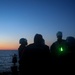 USS Bulkeley Sailors conduct a safety brief on the foc’sle prior to a night time sea-and-anchor transit