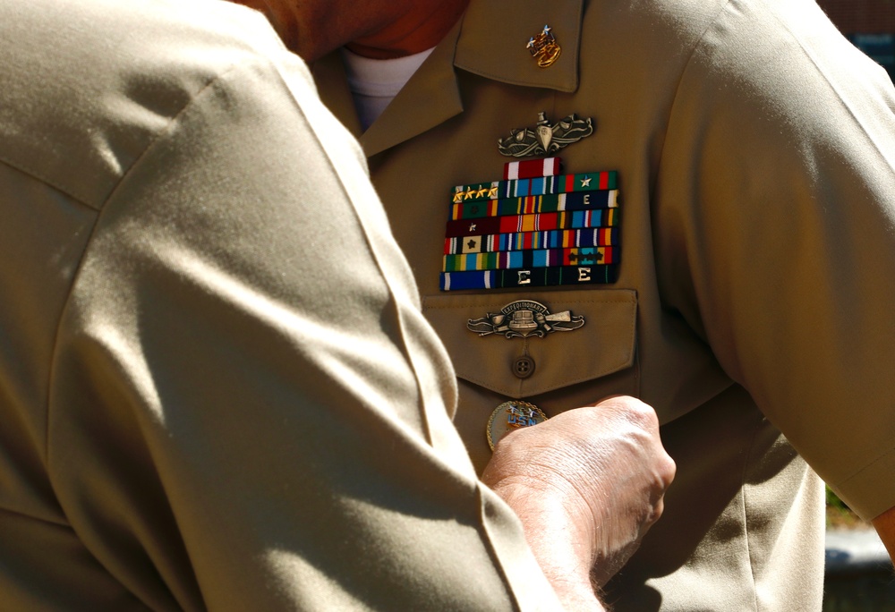 NMRC Command Master Chief Reenlists, Turns Over Office
