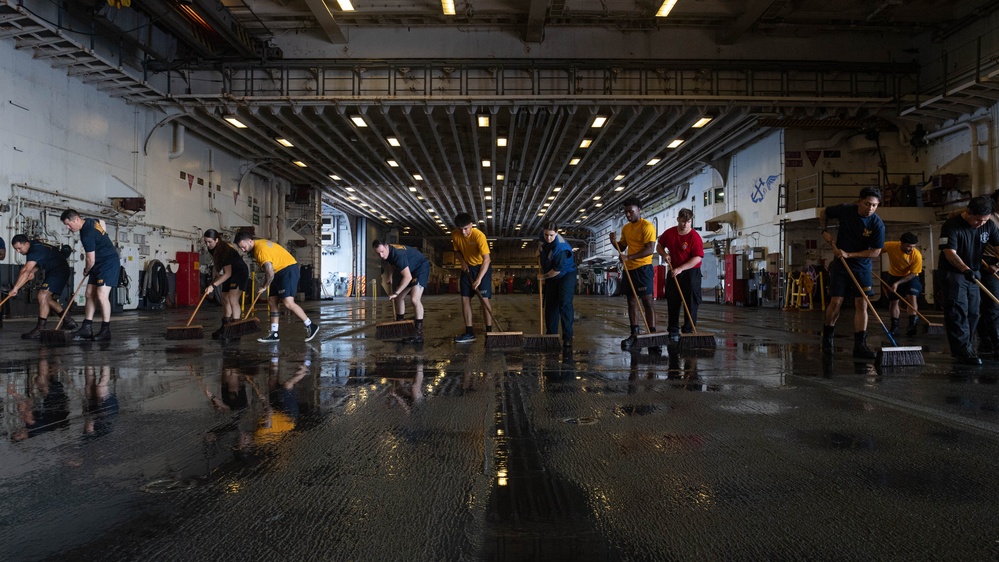 USS America (LHA 6) Conducts Hangar Bay Deep Cleaning