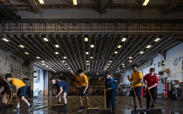 USS America (LHA 6) Conducts Hangar Bay Deep Cleaning