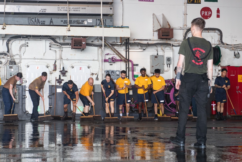 USS America (LHA 6) Conducts Hangar Bay Deep Cleaning