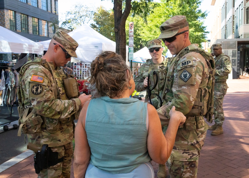 112th Military Police Battalion, Mississippi Army National Guard, patrol the Eastern Market Metro Station