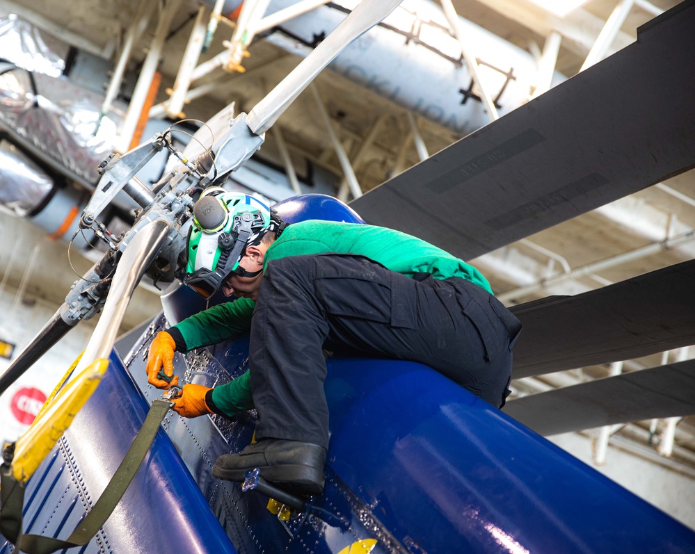 USS Gerald R. Ford (CVN 78) Sailor Conducts Maintenance