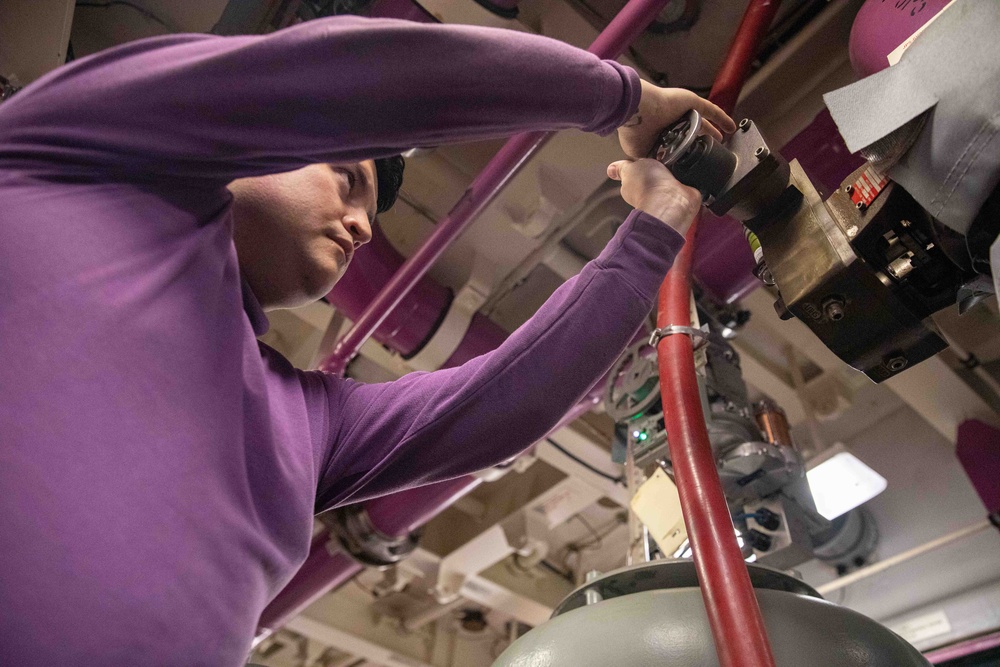 USS Gerald R. Ford (CVN 78) Sailor Conducts Maintenance