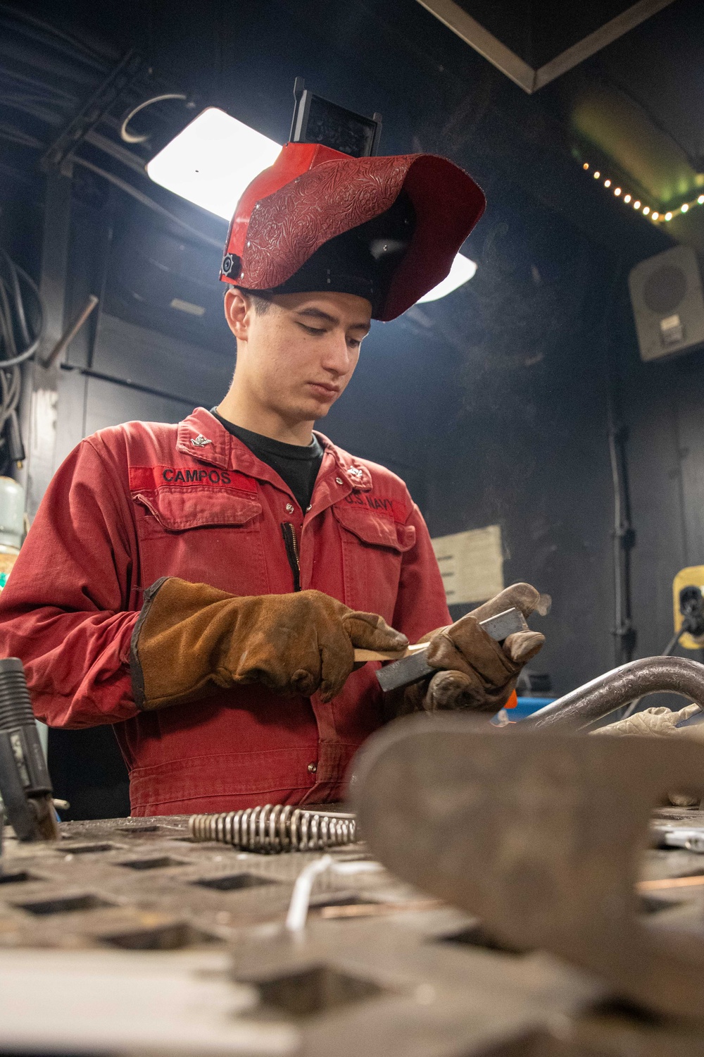 USS Gerald R. Ford (CVN 78) Sailor Conducts Maintenance