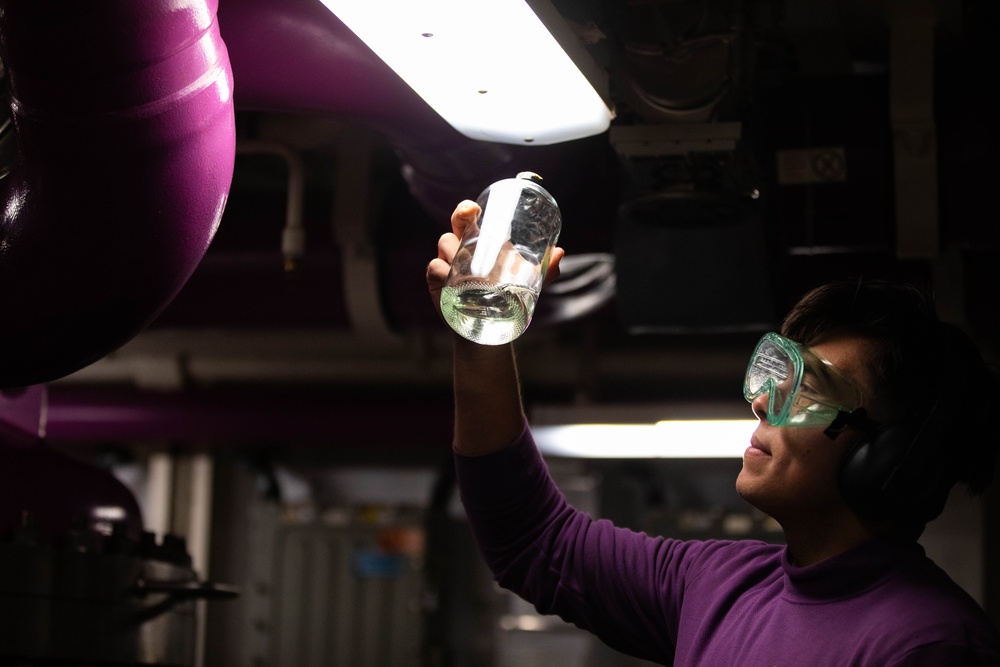 USS Gerald R. Ford (CVN 78) Sailor Tests a Fuel Sample