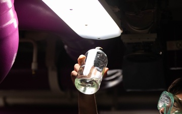 USS Gerald R. Ford (CVN 78) Sailor Tests a Fuel Sample