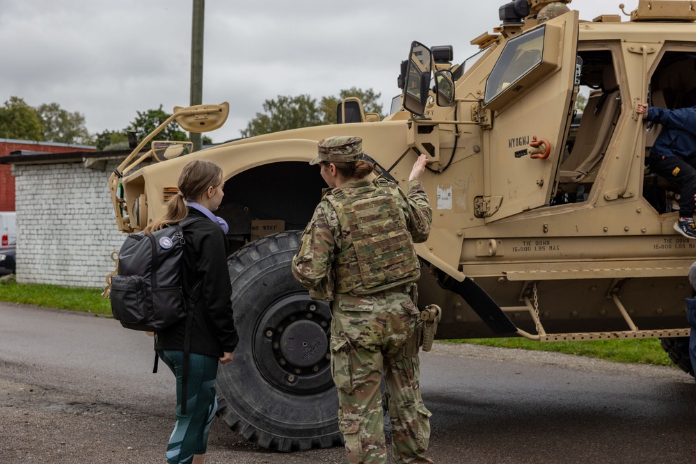 U.S. Army Soldiers display tactical vehicle to Estonian locals
