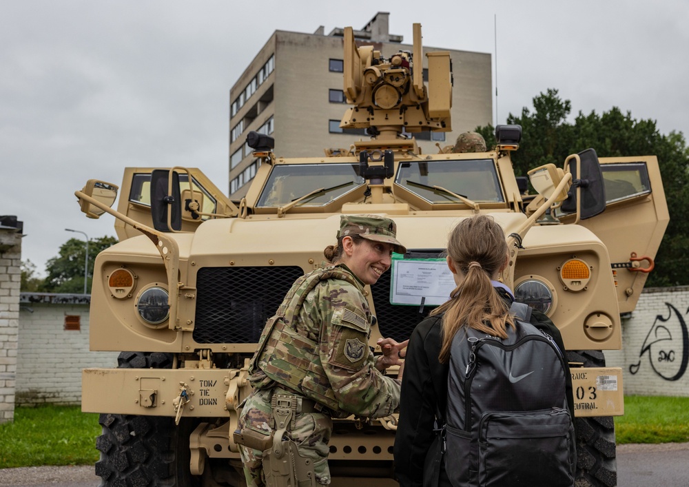 U.S. Army Soldiers display tactical vehicle to Estonian locals