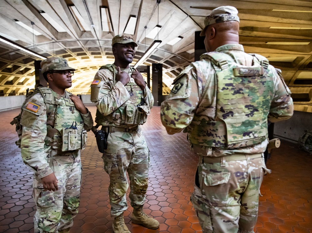 U.S. Soldiers with the 112th Military Police Battalion, MS National Guard, Patrol the Washington Metro