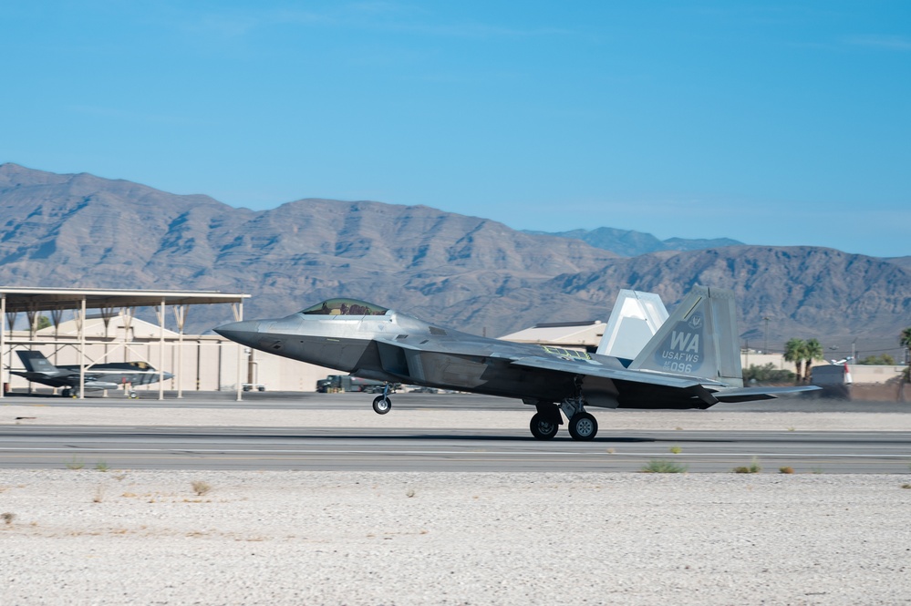 Nellis F-22s and F-15Es execute training missions