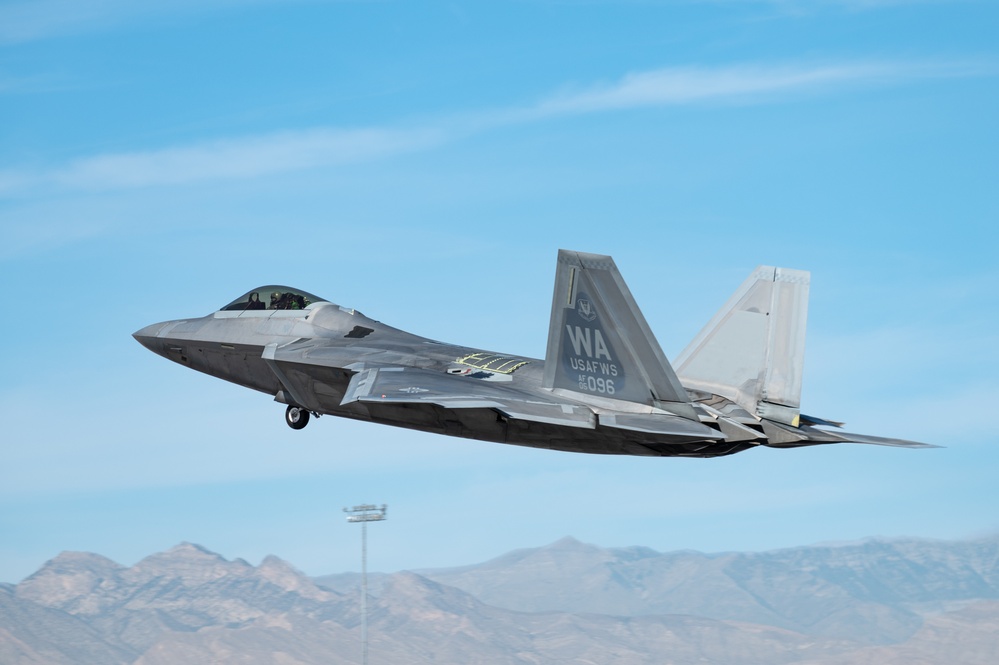 Nellis F-22s and F-15Es execute training missions