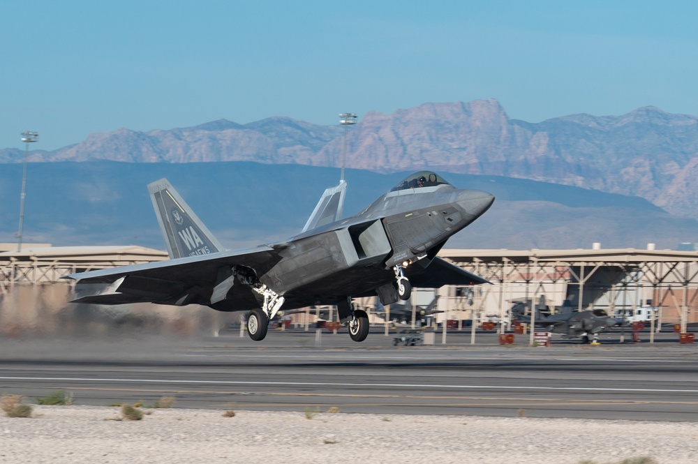 Nellis F-22s and F-15Es execute training missions