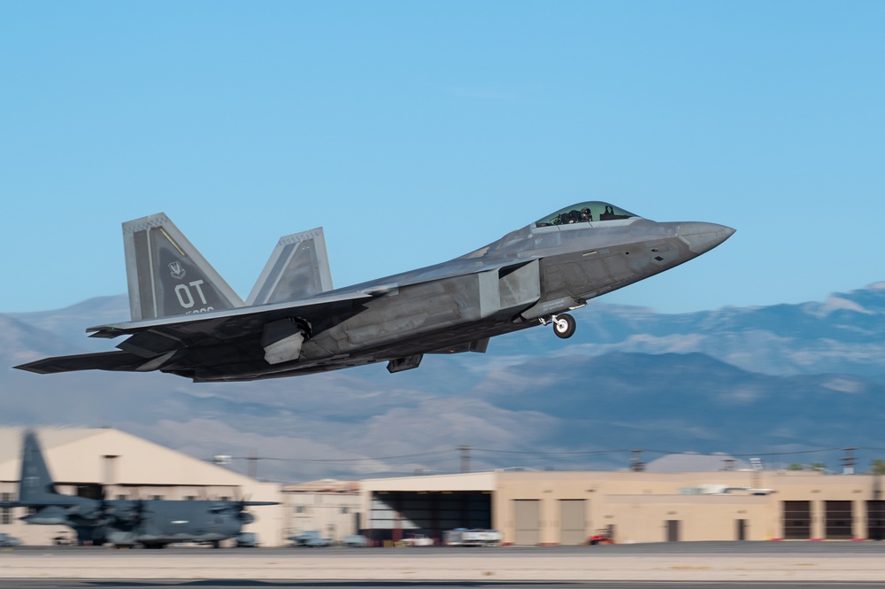 Nellis F-22s and F-15Es execute training missions