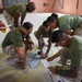 Marines and Sailors prepare for command post exercise during BRIGHT STAR 25