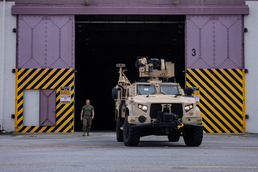 U.S. Marines Offload NMESIS and MADIS From USNS Guam