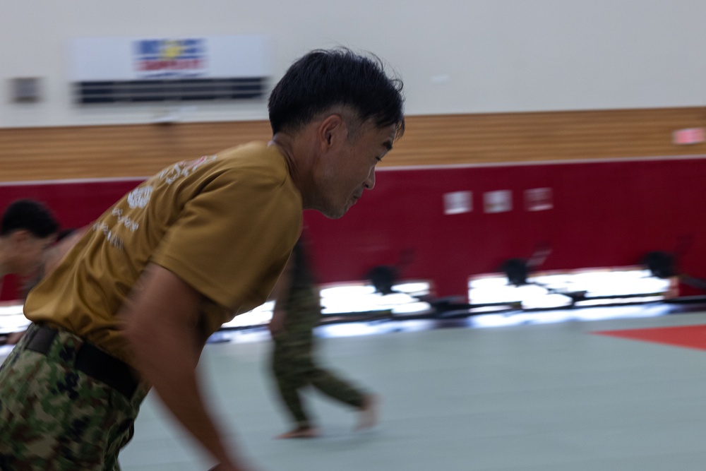 U.S. Marines and JGSDF Soldiers Exchange Combat Martial Arts Skills