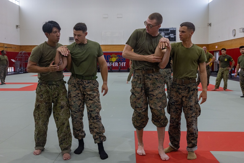 U.S. Marines and JGSDF Soldiers Exchange Combat Martial Arts Skills